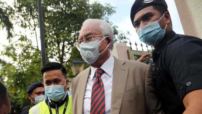 Najib Razak: Malaysian ex-PM gets 12-year jail term in 1MDB corruption trial (BBC News)