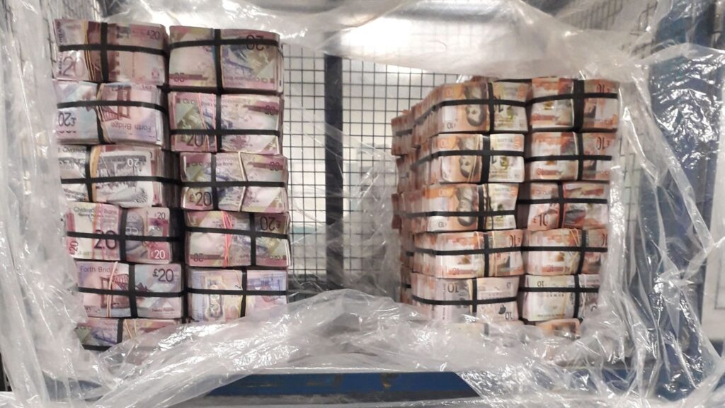 Police in London discovered more than £5m in cash in a flat