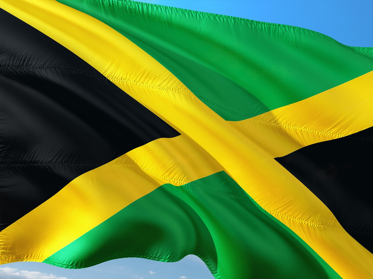 Real Estate Developers and Used Car Dealerships Will Soon be Brought Under Jamaica’s Anti-Money Laundering Laws